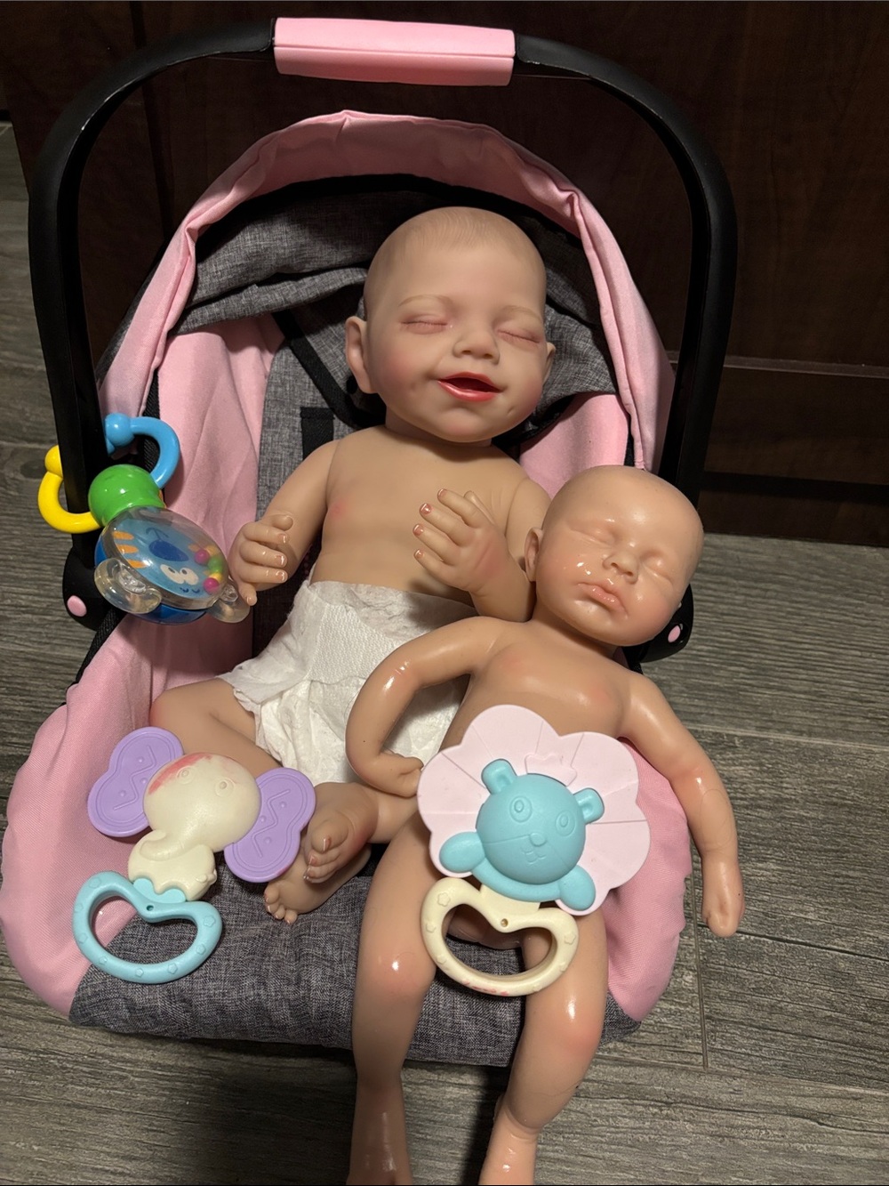 Baby Doll Carrier Set with Pink Fabric Seat and Two Dolls